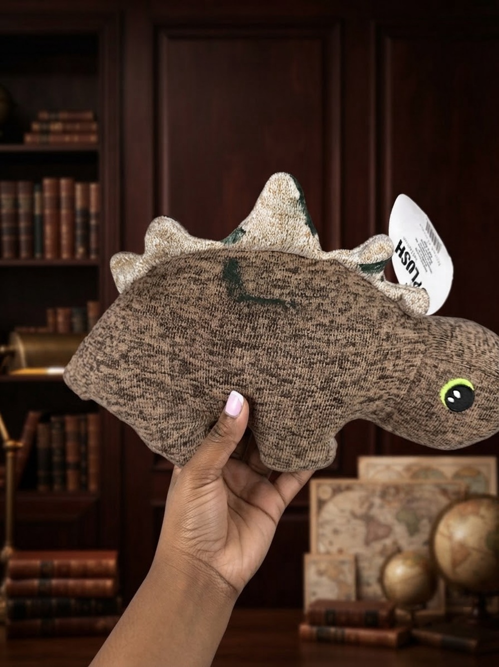 Plush Brown Dinosaur Dog Toy with Green Eye Accent